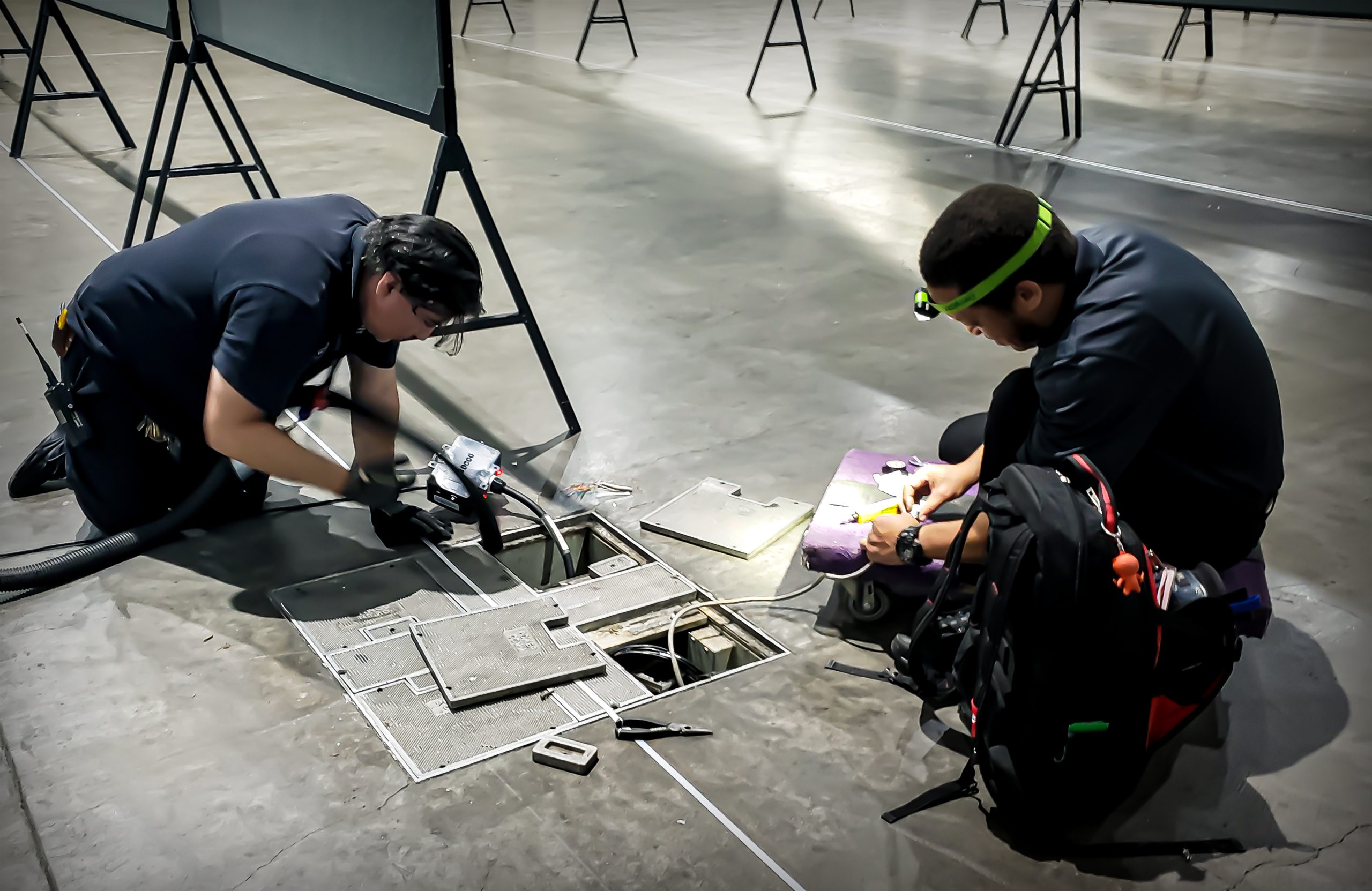 Techs setting up new floor box
